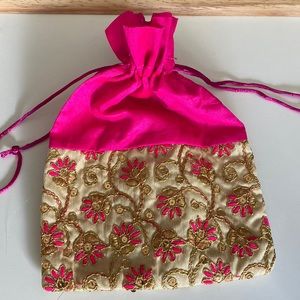 Beautiful hot pink & gold embroidered purse.